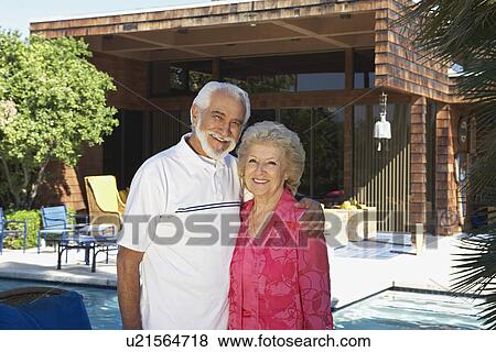 Portrait of senior couple outside house View Large Photo Image Stock Photo - Portrait of senior couple outside house. Fotosearch