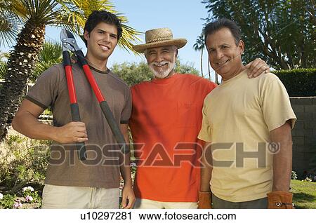 Stock Image - Portrait of three men gardening. Fotosearch