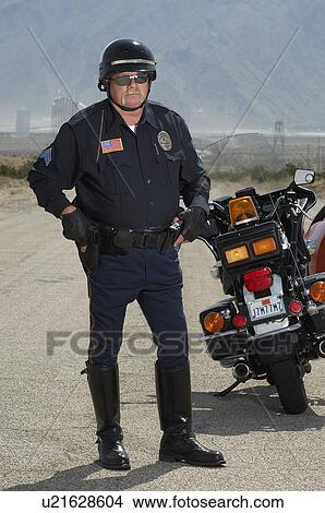 Portrait of traffic cop on road View Large Photo Image Picture - Portrait of traffic cop on road. Fotosearch