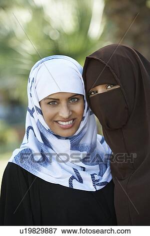 Portrait of two muslim women View Large Photo Image Stock Photo - Portrait of two muslim women. Fotosearch