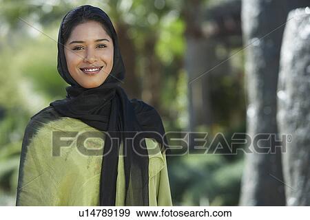 Stock Photo - Portrait of young muslim woman. Fotosearch