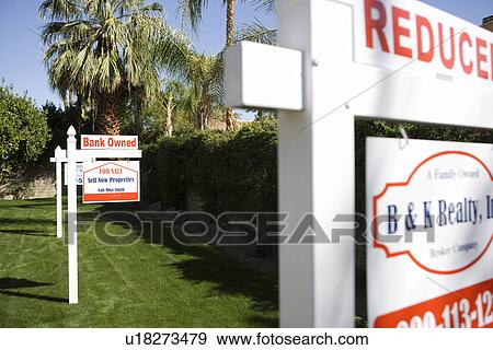 Real Estate Signs at Foreclosed Property View Large Photo Image Stock Photo - Real Estate Signs at Foreclosed Property. Fotosearch