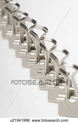 Stock Photo - Row of binder clip on white background. Fotosearch