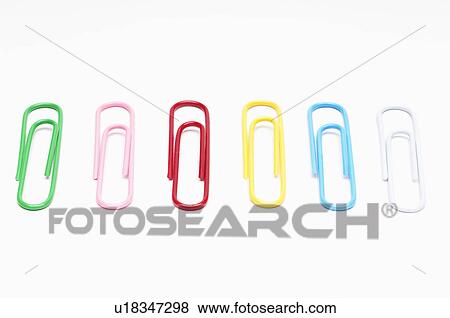 Row of multi colored paper clips View Large Photo Image Stock Photo - Row of multi colored paper clips. Fotosearch
