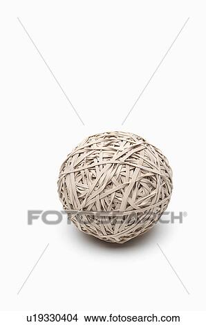 Picture - Rubber band ball on white background. Fotosearch