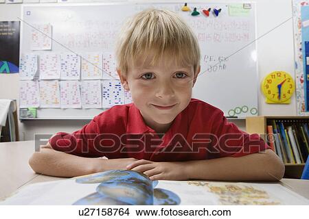 Picture - Schoolboy Studying. Fotosearch
