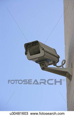 Security camera on wall View Large Photo Image Stock Image - Security camera on wall. Fotosearch