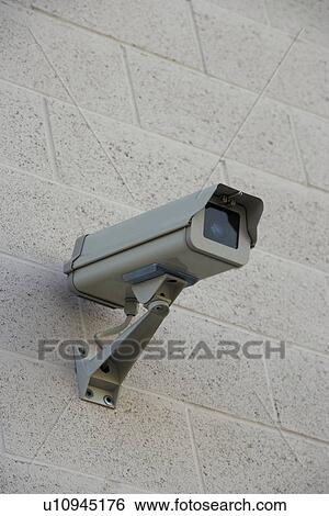 Security camera on wall View Large Photo Image Stock Photograph - Security camera on wall. Fotosearch