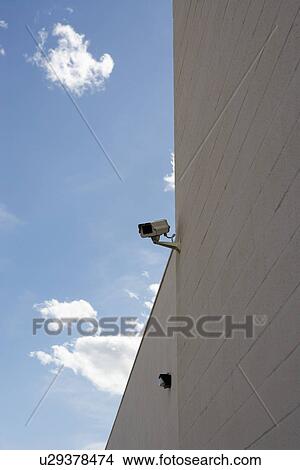 Picture - Security cameras on building wall. Fotosearch