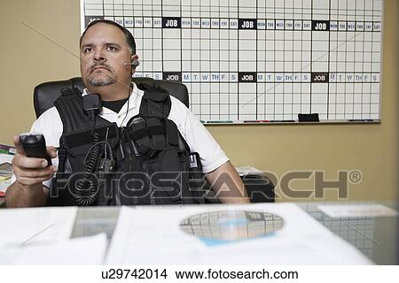 Security guard at work View Large Photo Image Picture - Security guard at work. Fotosearch
