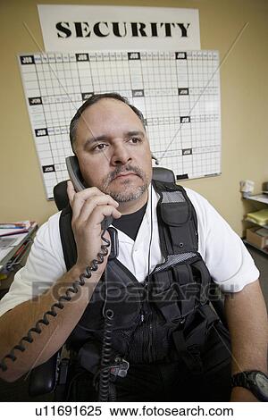 Security guard at work View Large Photo Image Stock Photography - Security guard at work. Fotosearch