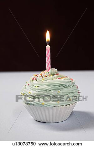 Single cupcake with birthday candle View Large Photo Image Stock Image - Single cupcake with birthday candle. Fotosearch