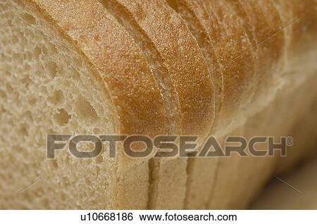 Stock Photograph - Sliced bread, close-up. Fotosearch