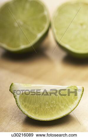 Sliced lime, close-up View Large Photo Image Stock Photo - Sliced lime, close-up. Fotosearch