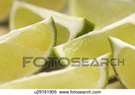 Sliced lime, close-up View Large Photo Image Stock Photography - Sliced lime, close-up. Fotosearch