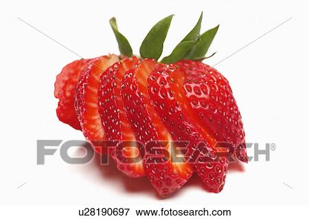 Sliced strawberry on white background View Large Photo Image Stock Photo - Sliced strawberry on white background. Fotosearch