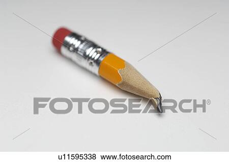 Stock Photo - Small broken pencil, close-up. Fotosearch