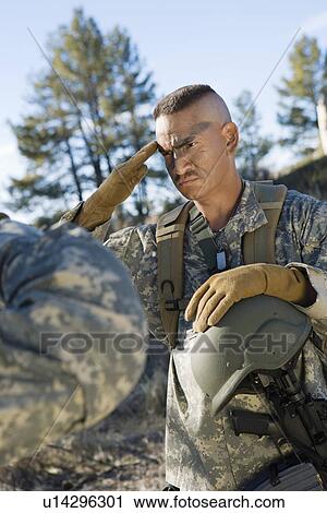 Stock Image - Soldier saluting. Fotosearch