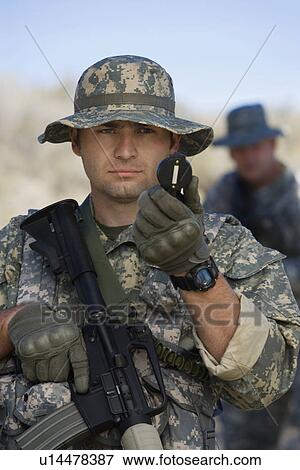 Soldier using compass View Large Photo Image Stock Photo - Soldier using compass. Fotosearch