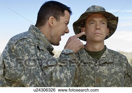 Soldier yelling at colleague View Large Photo Image Stock Photograph - Soldier yelling at colleague. Fotosearch