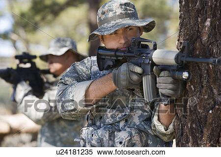Soldiers aiming machine guns View Large Photo Image Stock Photography - Soldiers aiming machine guns. Fotosearch