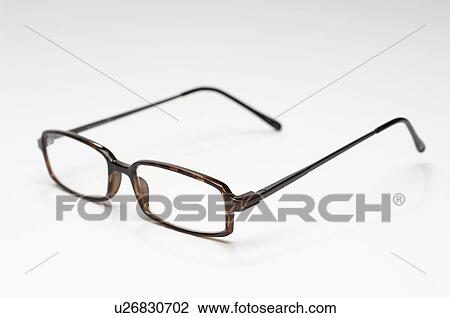 Stock Image - Spectacles on white background. Fotosearch