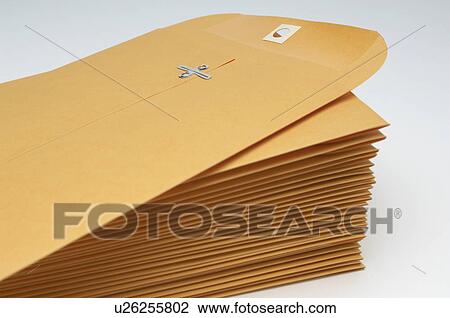 Stack of brown envelopes View Large Photo Image Stock Image - Stack of brown envelopes. Fotosearch