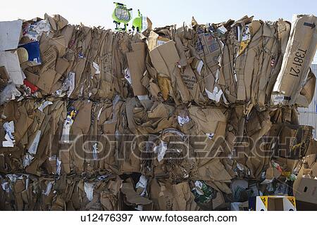 Stacks of cardboard boxes in recycling centre View Large Photo Image Stock Photo - Stacks of cardboard boxes in recycling centre. Fotosearch