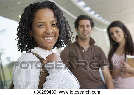 Students smiling in hallway at school, portrait View Large Photo Image Stock Photo - Students smiling in hallway at school, portrait. Fotosearch