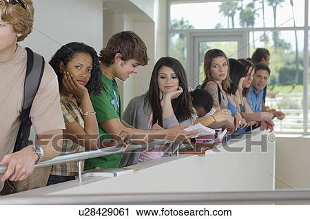 Students standing on balcony in school View Large Photo Image Stock Image - Students standing on balcony in school. Fotosearch