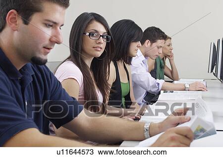 Students working in computer classroom View Large Photo Image Stock Image - Students working in computer classroom. Fotosearch