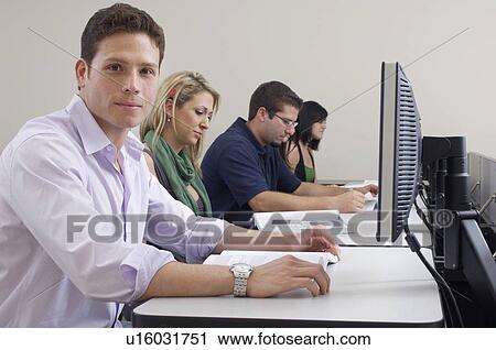 Students working in computer classroom View Large Photo Image Stock Image - Students working in computer classroom. Fotosearch