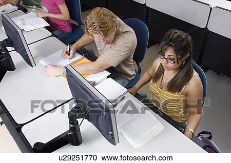 Students working in computer classroom View Large Photo Image Stock Image - Students working in computer classroom. Fotosearch