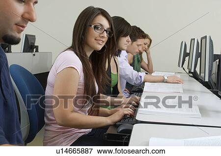 Students working in computer classroom View Large Photo Image Stock Photo - Students working in computer classroom. Fotosearch