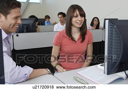 Students working in computer classroom View Large Photo Image Stock Photo - Students working in computer classroom. Fotosearch