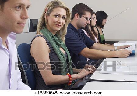 Students working in computer classroom View Large Photo Image Stock Photography - Students working in computer classroom. Fotosearch