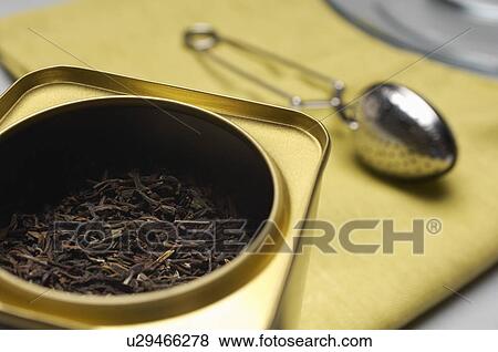 Tea box and strainer View Large Photo Image Stock Photo - Tea box and strainer. Fotosearch