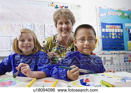 Stock Photograph - Teacher and Elementary Students. Fotosearch