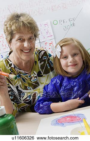 Teacher and Student Painting View Large Photo Image Stock Photograph - Teacher and Student Painting. Fotosearch