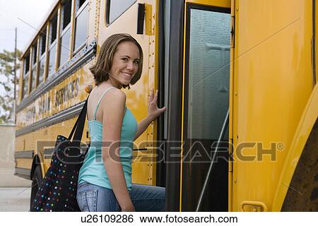 Teenage Girl Getting on School Bus View Large Photo Image Stock Photograph - Teenage Girl Getting on School Bus. Fotosearch