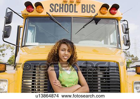 Teenager Girl by School Bus View Large Photo Image Picture - Teenager Girl by School Bus. Fotosearch