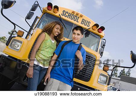 Teenagers by School Bus View Large Photo Image Stock Image - Teenagers by School Bus. Fotosearch