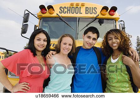 Teenagers by School Bus View Large Photo Image Stock Photograph - Teenagers by School Bus. Fotosearch