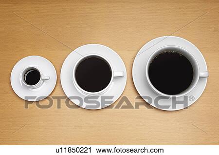 Three coffee cups of various sizes View Large Photo Image Stock Image - Three coffee cups of various sizes. Fotosearch