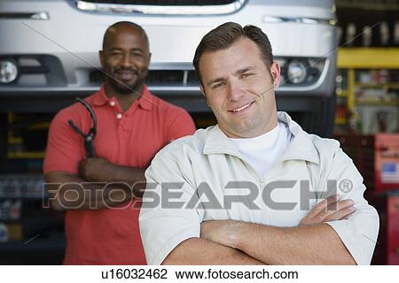 Two Men in an Auto Shop View Large Photo Image Stock Image - Two Men in an Auto Shop. Fotosearch
