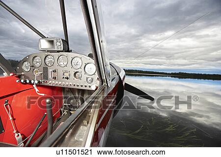 USA, Alaska, cockpit of sea plane on lake, close up View Large Photo Image Stock Image - USA, Alaska, cockpit of sea plane on lake, close up. Fotosearch