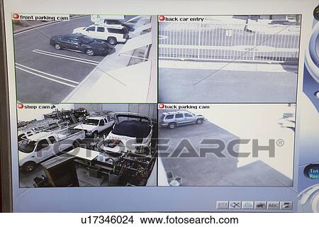 Picture - Video monitor with picture from security cameras. Fotosearch
