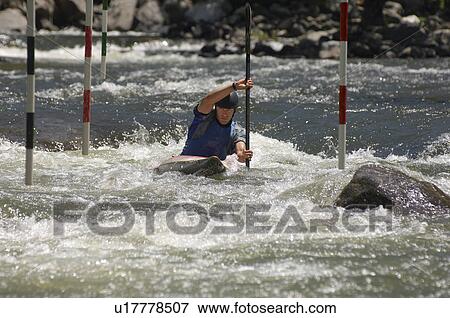 Stock Photo - Whitewater kayaking. Fotosearch