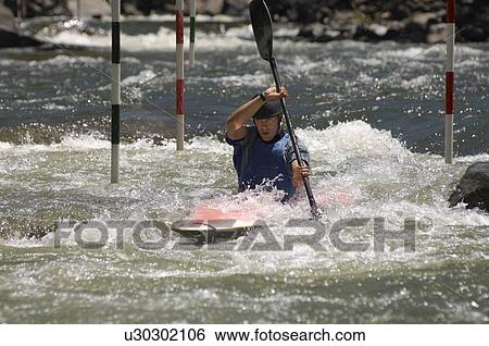 Stock Photograph - Whitewater kayaking. Fotosearch