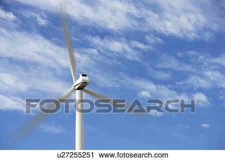 Stock Image - Wind turbine at wind farm. Fotosearch